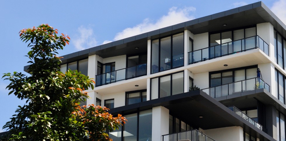 Flat and Low-Slope Roofing Systems That Work Best for Multi-Family Buildings